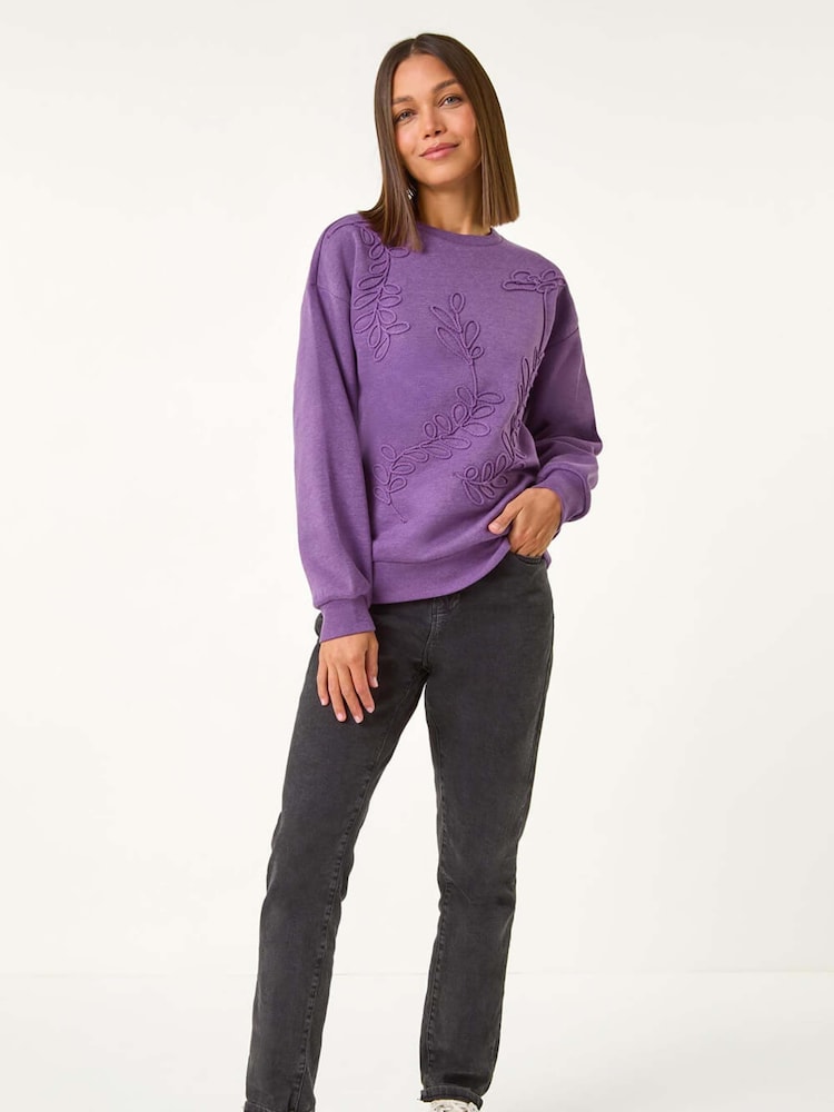 Lila - Roman – Sweatshirt mit Blumenstickerei - Bild 1 von 5 Lila - Roman – Sweatshirt mit Blumenstickerei - Bild 1 von 5