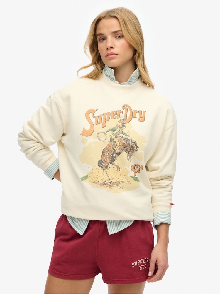 Superdry Cream Souvenir Graphic Loose Crew 100% Cotton Sweat Shirt - Image 1 of 6 Superdry Cream Souvenir Graphic Loose Crew 100% Cotton Sweat Shirt - Image 1 of 6