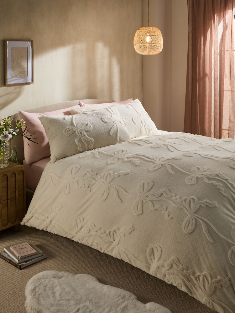 White Cream Bow Christmas Faux Fur Icons Duvet Cover and Pillowcase Set - Image 1 of 4
