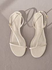 Bone White Leather Signature Strappy Toe Thong Sandals - Image 1 of 7