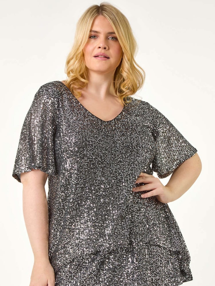 Metalizado - Roman Curve Flare Sleeve Sequin Top - Imagen 1 de 5 Metalizado - Roman Curve Flare Sleeve Sequin Top - Imagen 1 de 5