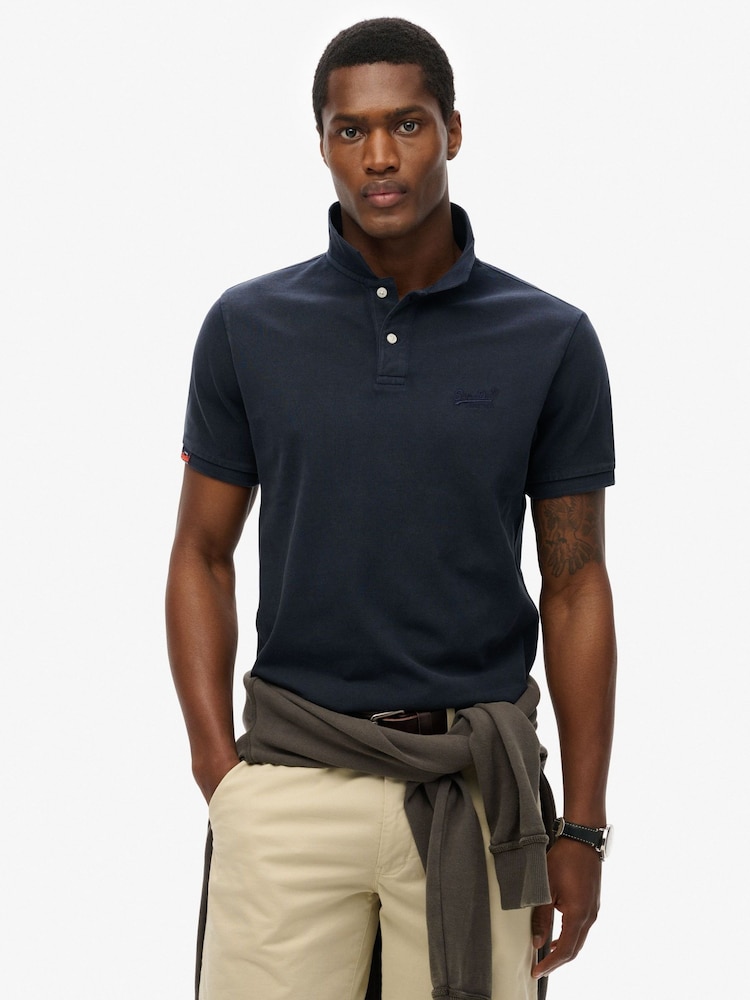 Superdry Blue Dark Vintage Destroy Relaxed 100% Cotton Polo Shirt - Image 1 of 6 Superdry Blue Dark Vintage Destroy Relaxed 100% Cotton Polo Shirt - Image 1 of 6