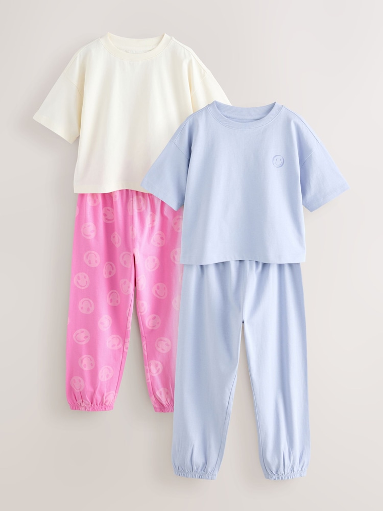 Pink/Blue Happy Face Joggers Pyjamas 2 Pack (3-16yrs) - Image 1 of 6