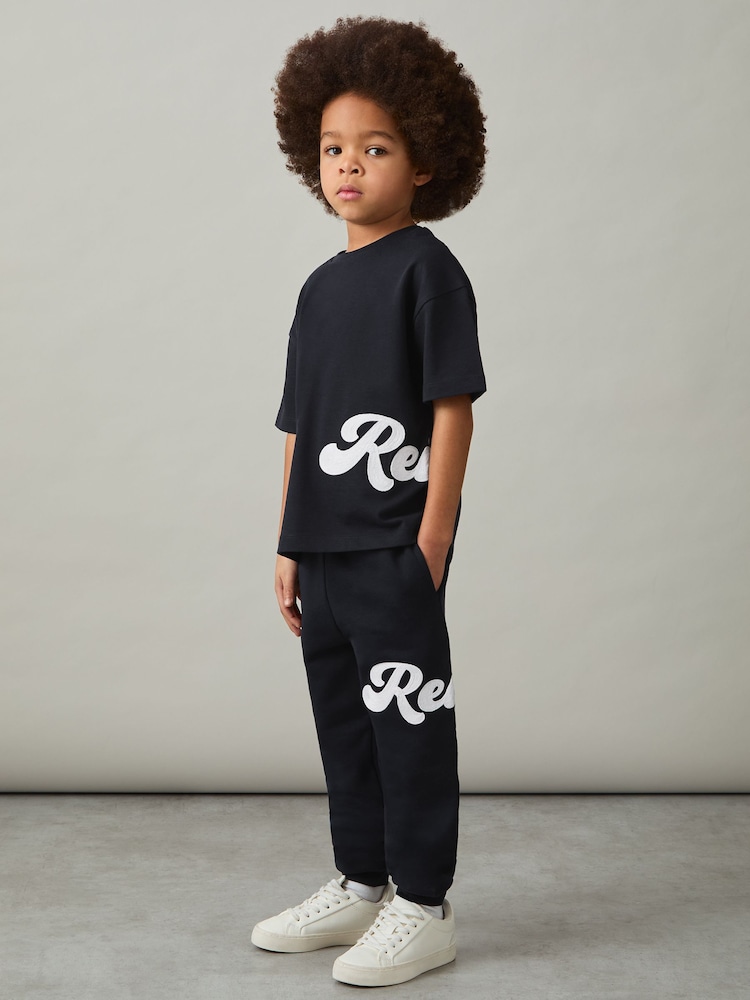 Reiss Navy Freddie 3-9 yrs Cotton Script-Logo Oversized T-Shirt - Image 1 of 4