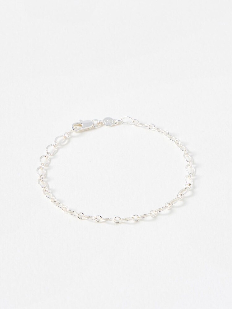 Oliver Bonas Silver Tone Nivia Textured Links Chain Bracelet - Image 1 of 3 Oliver Bonas Silver Tone Nivia Textured Links Chain Bracelet - Image 1 of 3