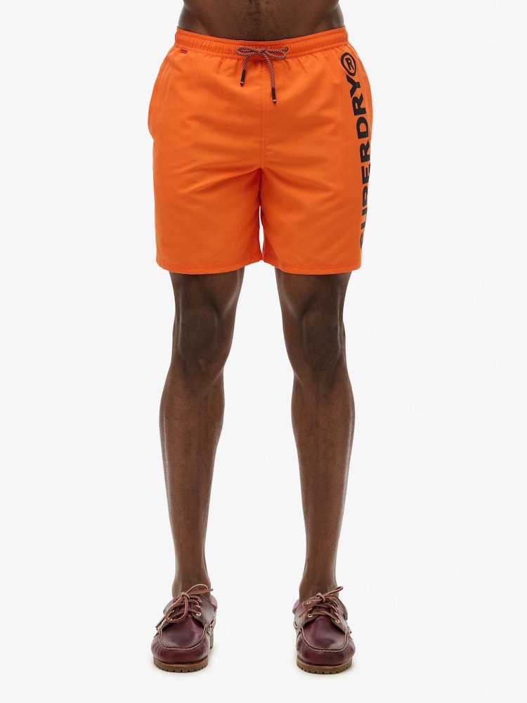 Superdry Orange/Black Sport Graphic 17 Swim Shorts - Image 1 of 7 Superdry Orange/Black Sport Graphic 17 Swim Shorts - Image 1 of 7