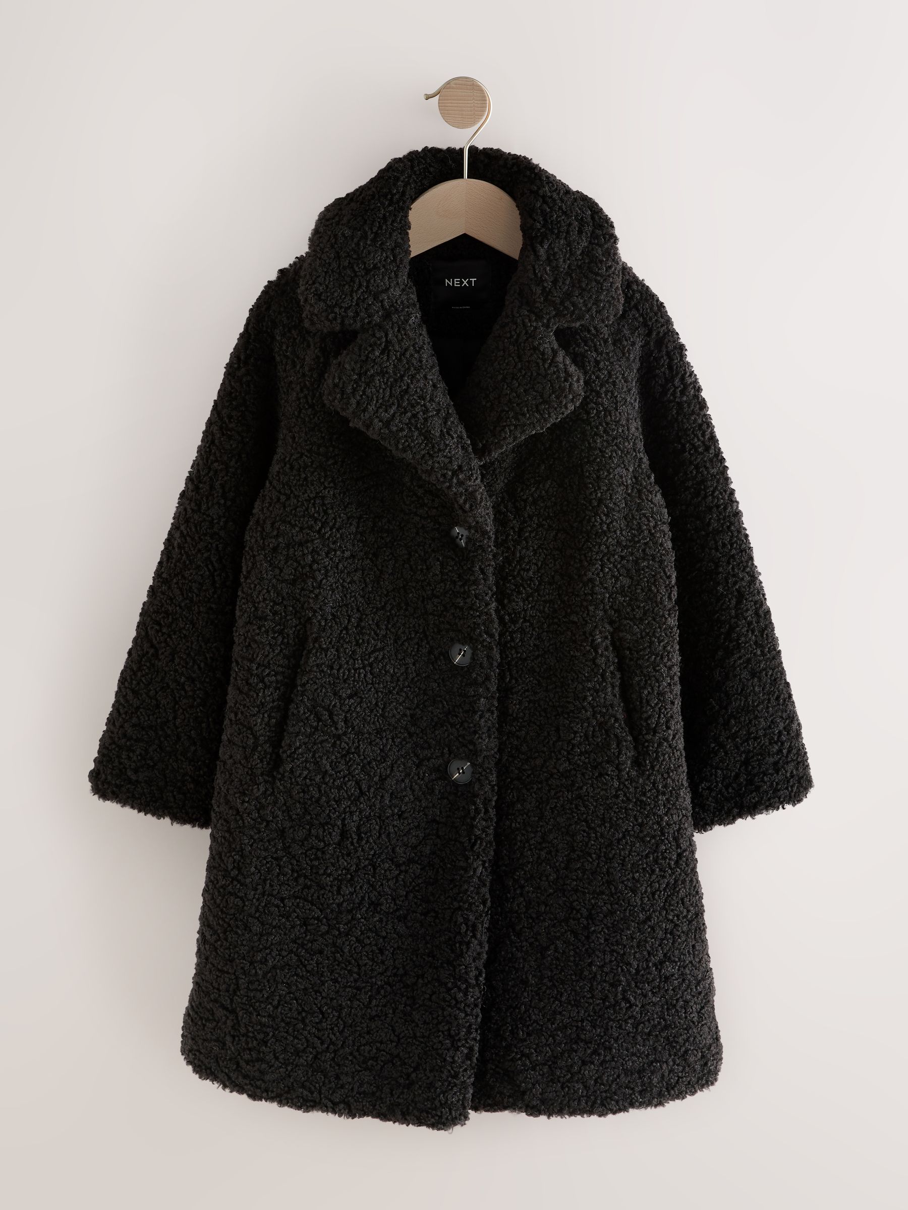 Buy Black Longline Teddy Borg Fleece Coat (3-16yrs) from Next USA