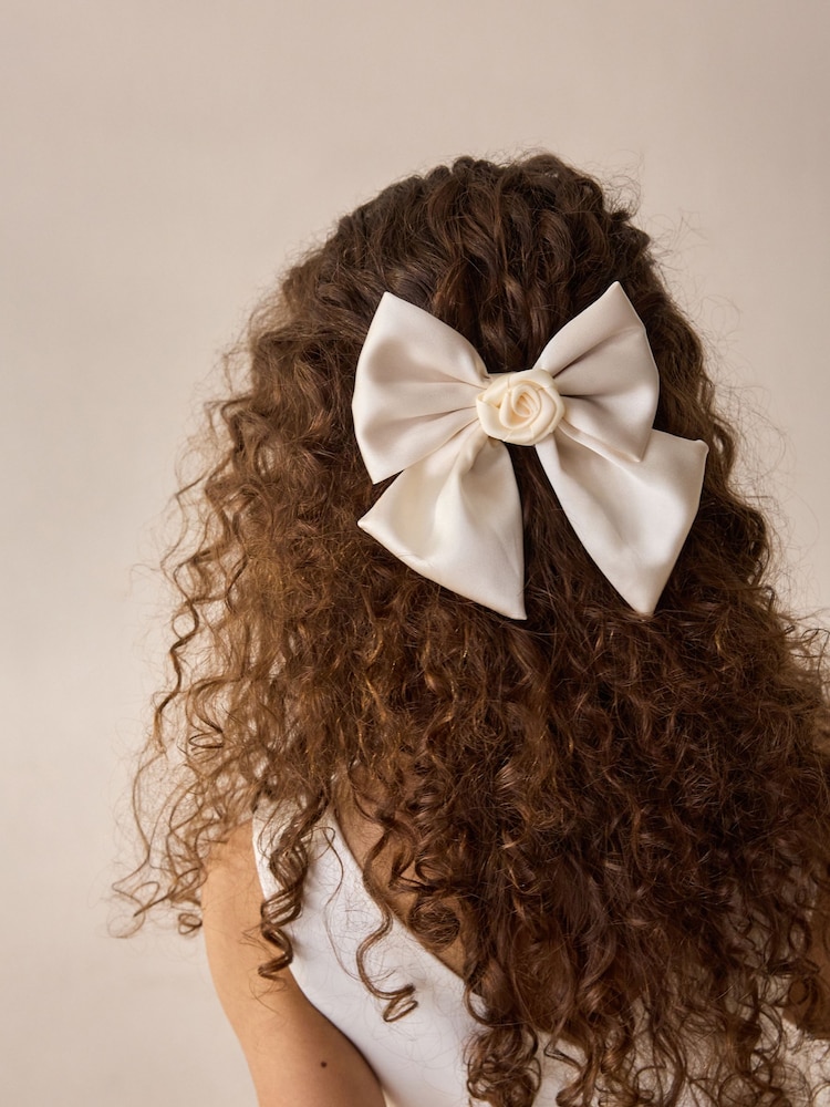 Cream Bow Clip - Image 1 of 2