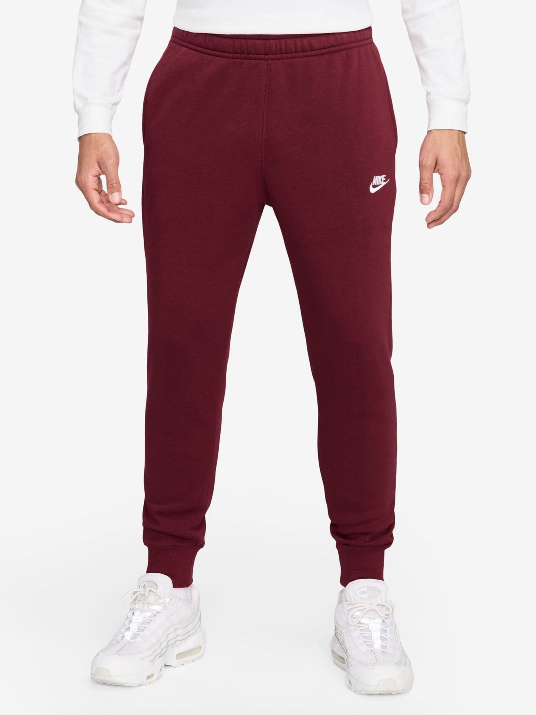 red and white nike joggers