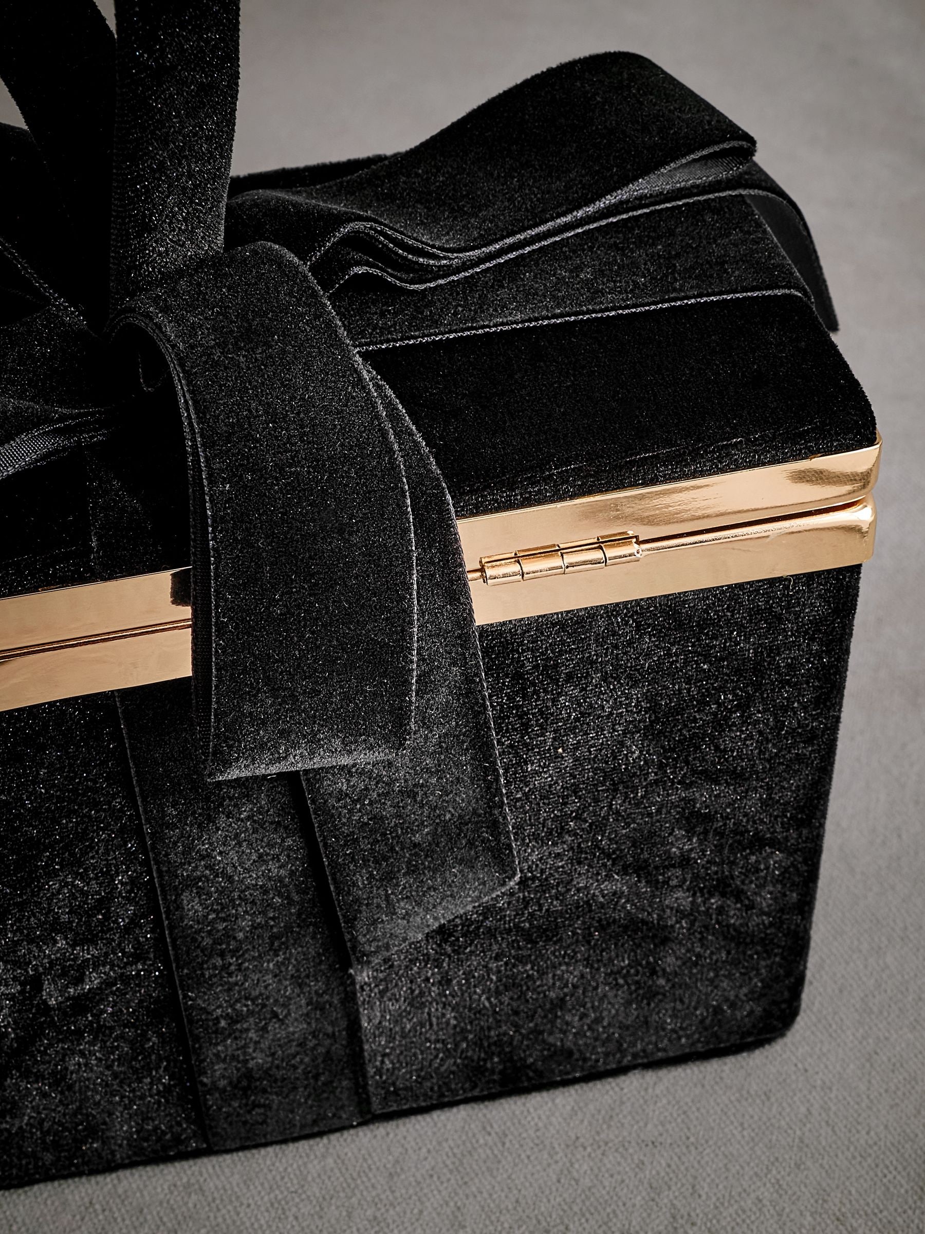 Black box clutch bag 2025