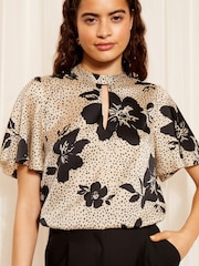 Friends Like These Floral Black/White Printed Flutter Sleeve Keyhole Blouse - Image 1 of 4