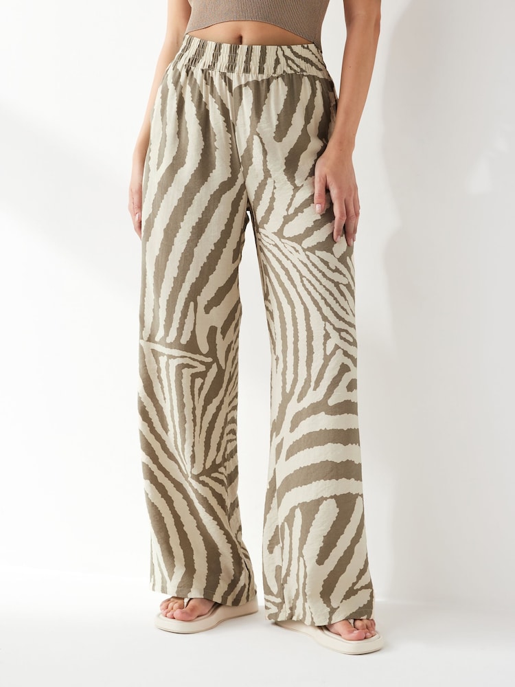 JDY Green Petite Zebra Print Wide Leg Trousers - Image 1 of 5