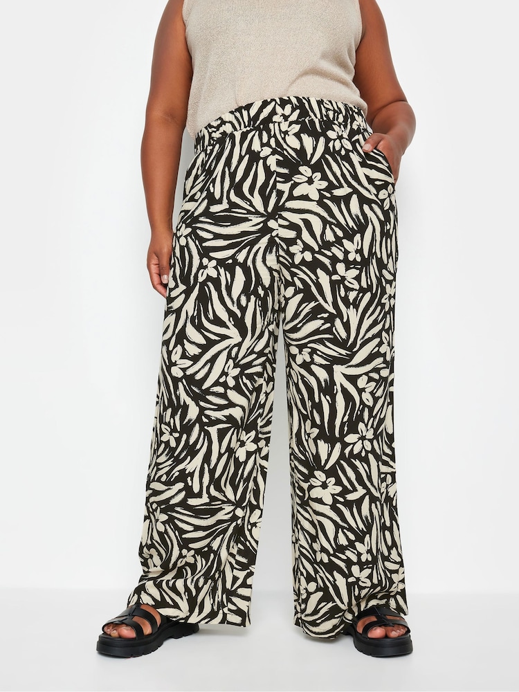 Yours Curve Black Floral Print Wide Leg Trousers - Image 1 of 6