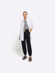 Calça joggers com punho de Lyocell da River Island - Imagem 1 de 3