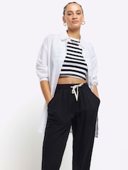 Calça joggers com punho de Lyocell da River Island - Imagem 2 de 3
