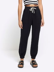 Calça joggers com punho de Lyocell da River Island - Imagem 3 de 3