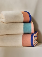 MADE.COM Peach and Blues Dax Border 100% Cotton Towel - Image 1 of 3