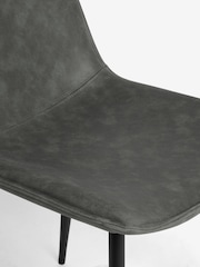 Monza Faux Leather Dark Grey Set of Arona Faux Leather Sawyer Dining Chairs and Extending Dining Table - Image 9 of 12