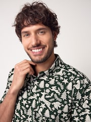 Grün/Weiß - Polo-Shirt in weihnachtlichem Print - Bild 1 von 1