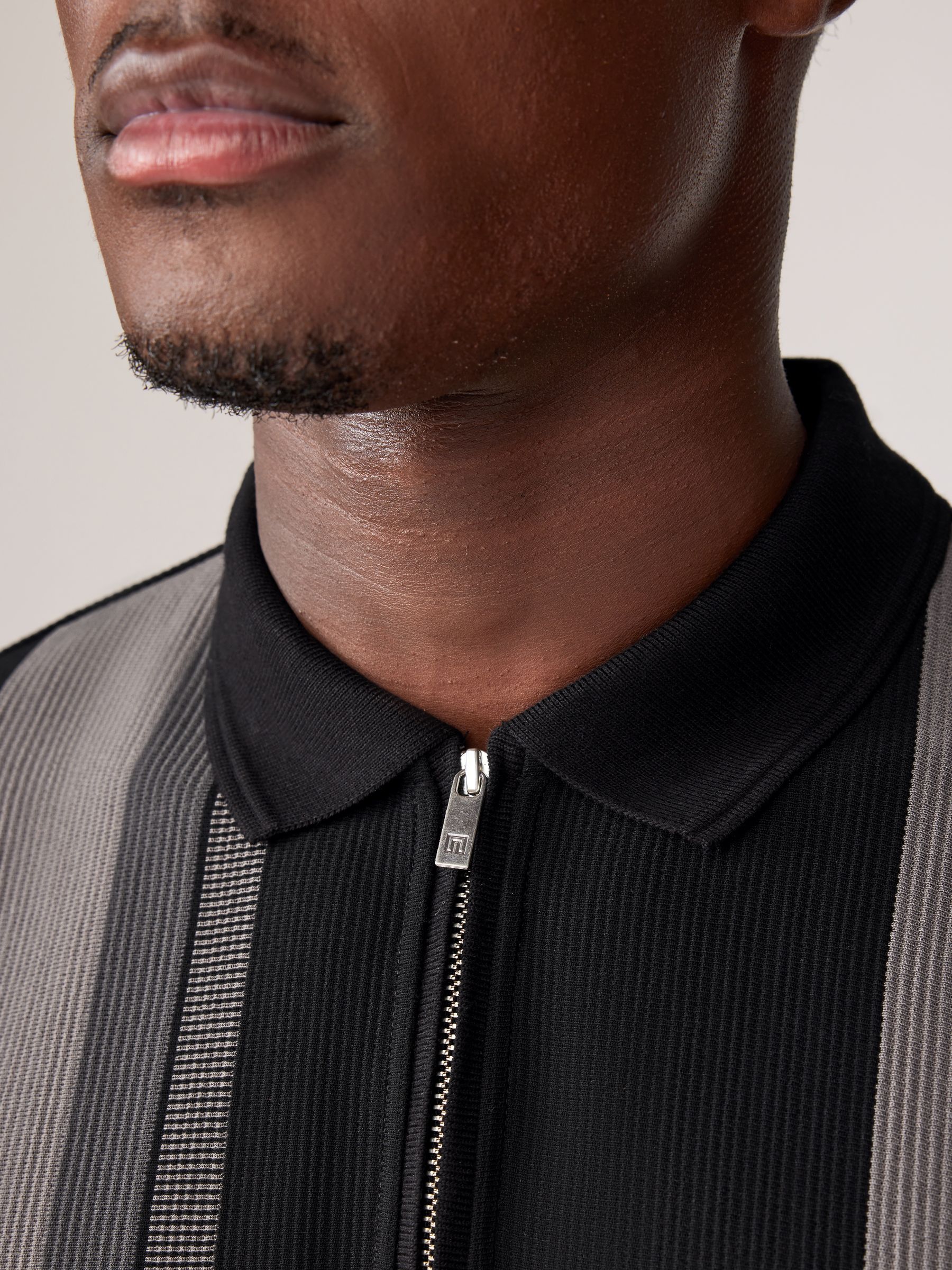 Buy Black/White Vertical Stripe Quarter Zip Polo Shirt from
