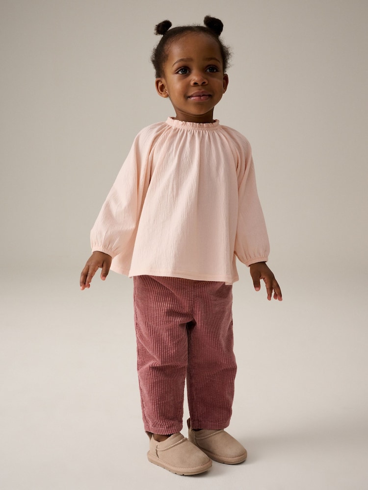Pink Long Sleeve Gathered Neck Blouse (3mths-7yrs) - Image 1 of 7 Pink Long Sleeve Gathered Neck Blouse (3mths-7yrs) - Image 1 of 7