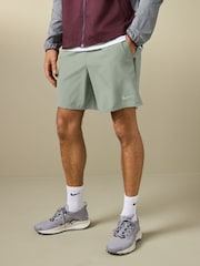 Nike Green 7 Inch Challenger Dri-FIT 7 inch Briefs Lined Running Shorts - Image 1 of 3