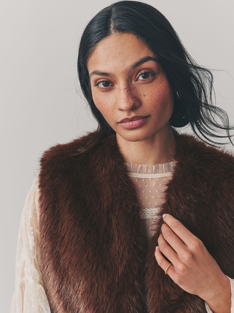 Buy Chocolate Brown Longline Faux Fur Gilet from the Next UK