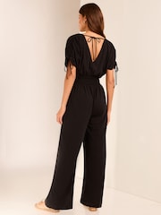 Lipsy Black V Neck Wrap Holiday Shop Jumpsuit - Image 3 of 4