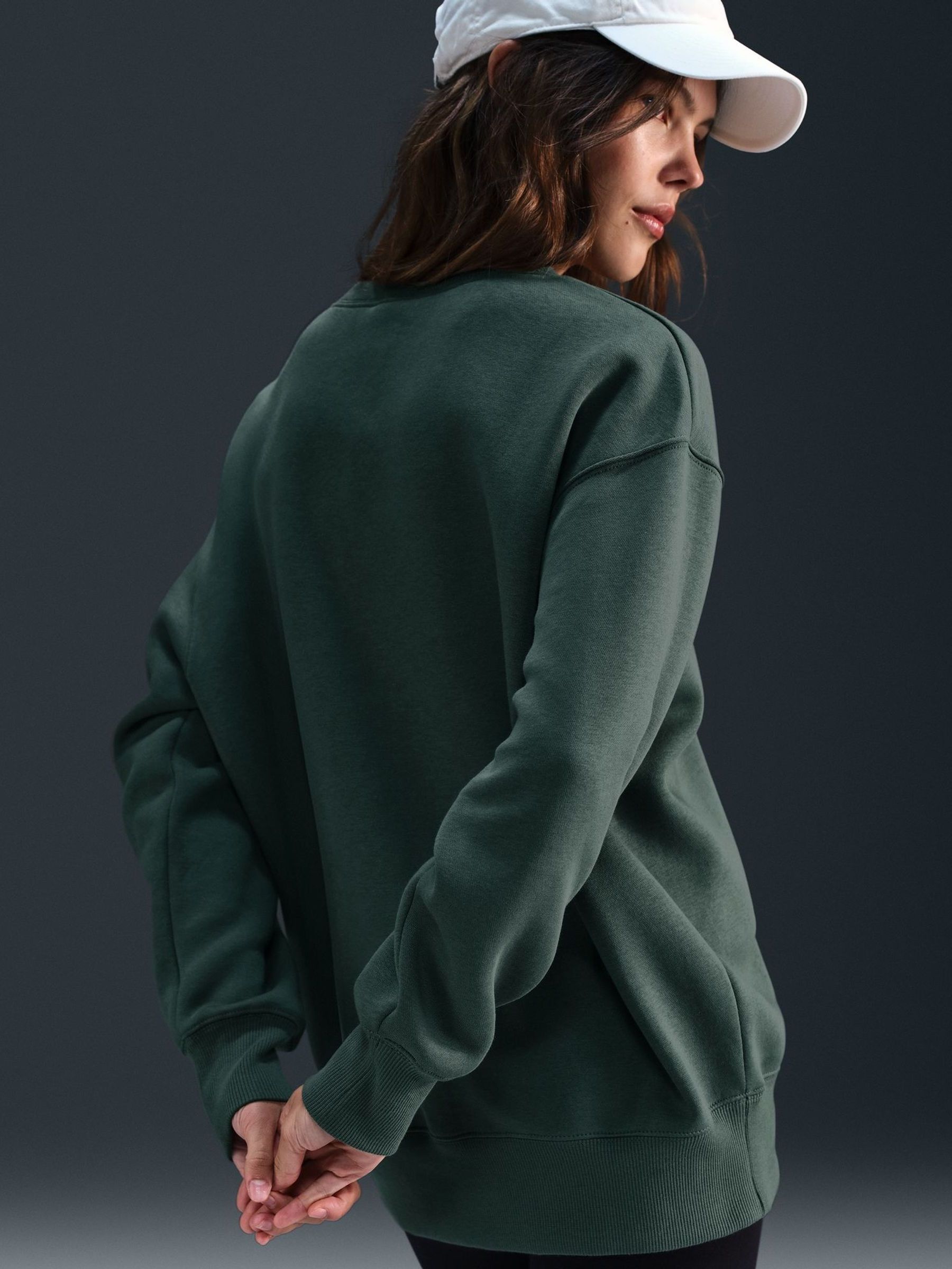 Buy Nike Dark Green Phoenix Fleece Oversized Mini Swoosh Crew Neck Sweatshirt from the Next UK online shop