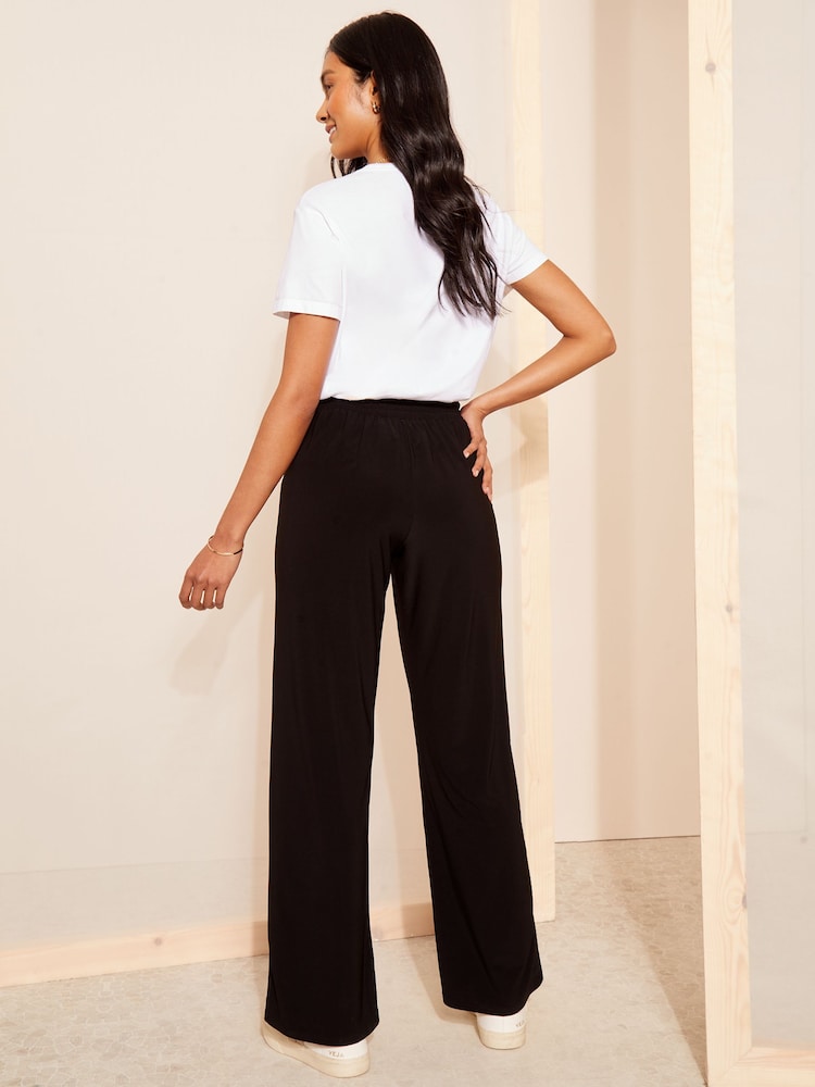 Friends Like These Black Elasticated Wasit Soft Slinky Wide Leg Trousers - Image 4 of 4 Friends Like These Black Elasticated Wasit Soft Slinky Wide Leg Trousers - Image 4 of 4