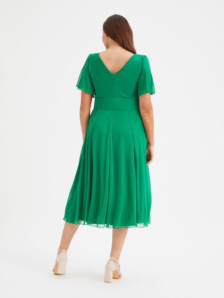 Verde - Vestido a media pierna de malla con mangas de ángel Victoria de Scarlett & Jo - Imagen 4 de 4 Verde - Vestido a media pierna de malla con mangas de ángel Victoria de Scarlett & Jo - Imagen 4 de 4