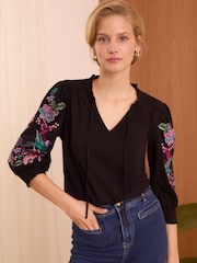 Love & Roses Black Bird V Neck Embroidered Sleeve Jersey Top - Image 1 of 4