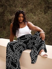 Yours Curve Black Abstract Print Shirred Wide Leg Trousers - Image 1 of 6