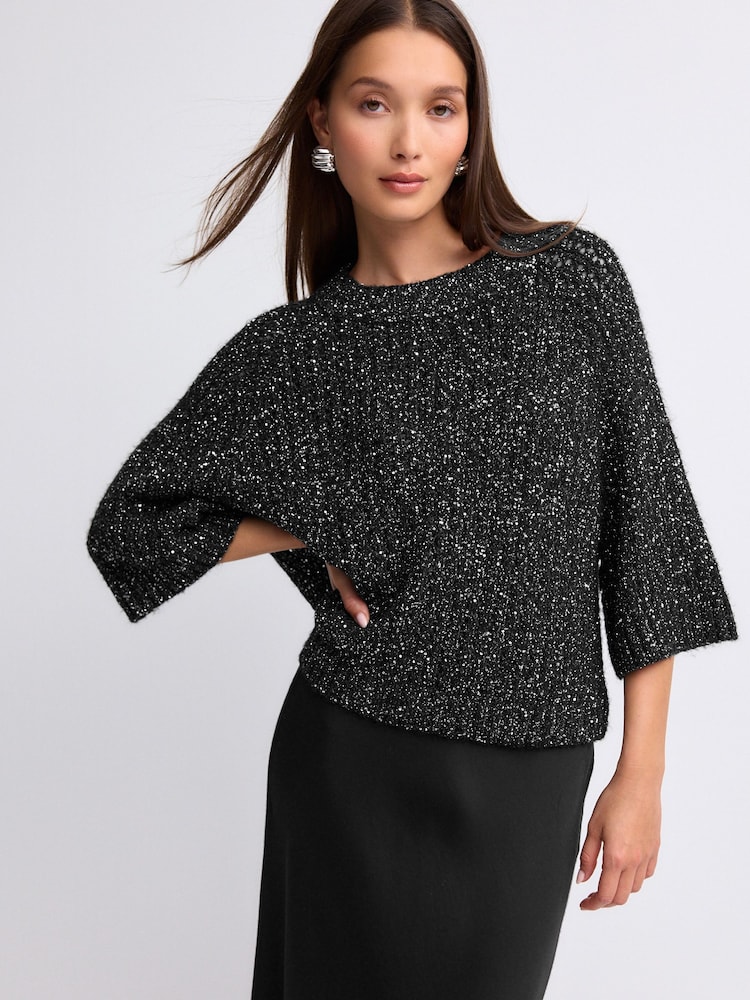 Schwarz, Glitzer - Pailletten-Mesh-Pullover mit halben Ärmeln - Bild 1 von 9 Schwarz, Glitzer - Pailletten-Mesh-Pullover mit halben Ärmeln - Bild 1 von 9