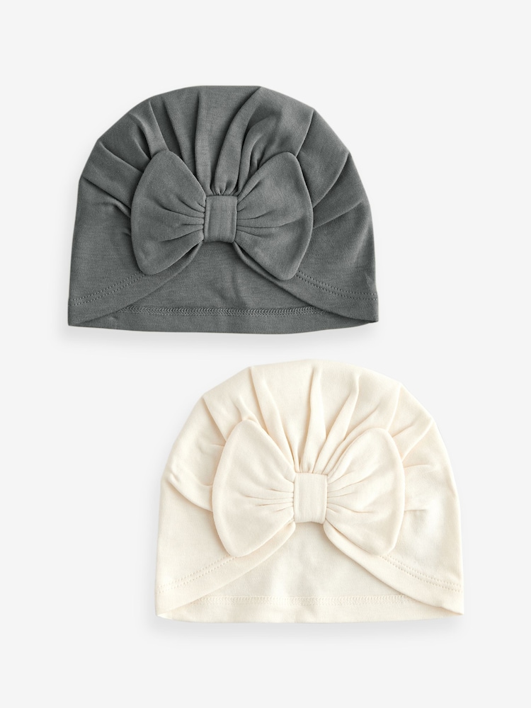 Schwarz/Weiß - Baby-Turban-Mützen mit Schleife aus 100 % Baumwolle 2er-Pack (0–18 M.) - Bild 1 von 3 Schwarz/Weiß - Baby-Turban-Mützen mit Schleife aus 100 % Baumwolle 2er-Pack (0–18 M.) - Bild 1 von 3