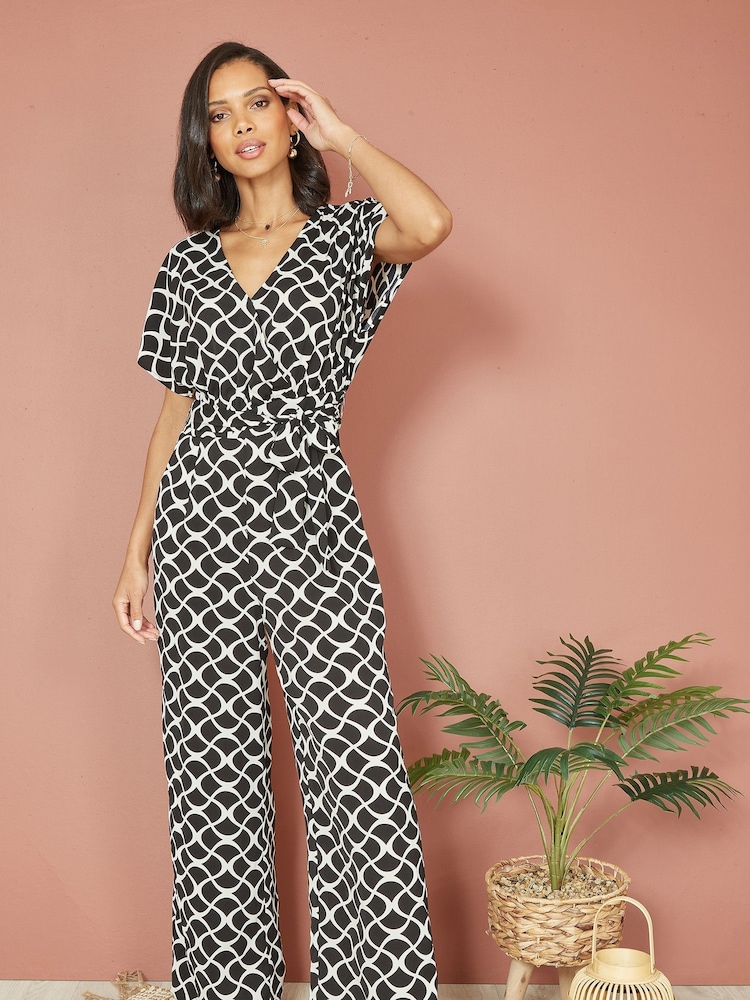 Yumi Black Geometric Print Wrap Jumpsuit - Image 1 of 5
