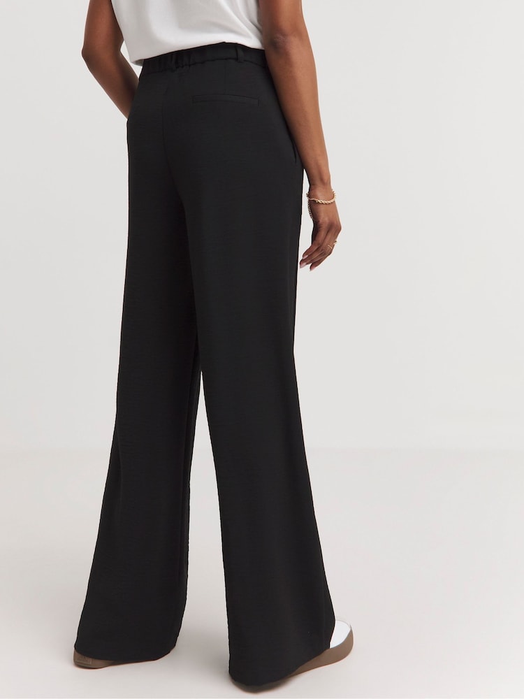 JD Williams Black Textured Pleated Wide Leg Trousers - Image 2 of 3