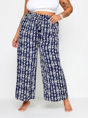 Yours Curve Blue Navy Ikat Print Crinkle Tassel Trousers - Image 1 of 5