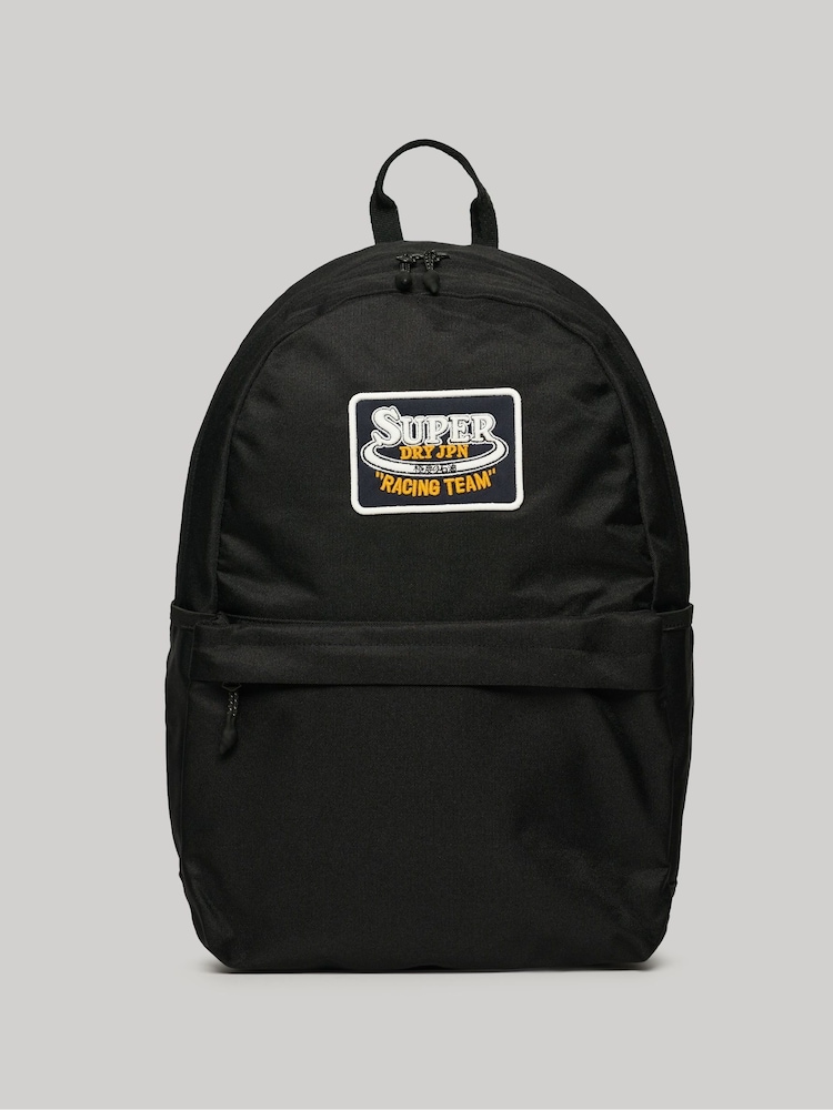 Superdry Black Patched Montana Backpack - Image 1 of 5 Superdry Black Patched Montana Backpack - Image 1 of 5