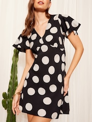 Friends Like These Black/White Flutter Sleeve Tie Back Mini Dress - Image 2 of 4