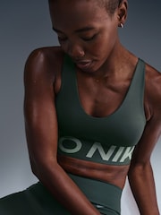 Nike Green Pro Indy Plunge Medium Support Padded Sports Bra - Image 1 of 6