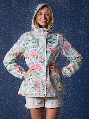 Joules Holt Cream Tile Print Waterproof Packable Raincoat with Hood - Image 1 of 11