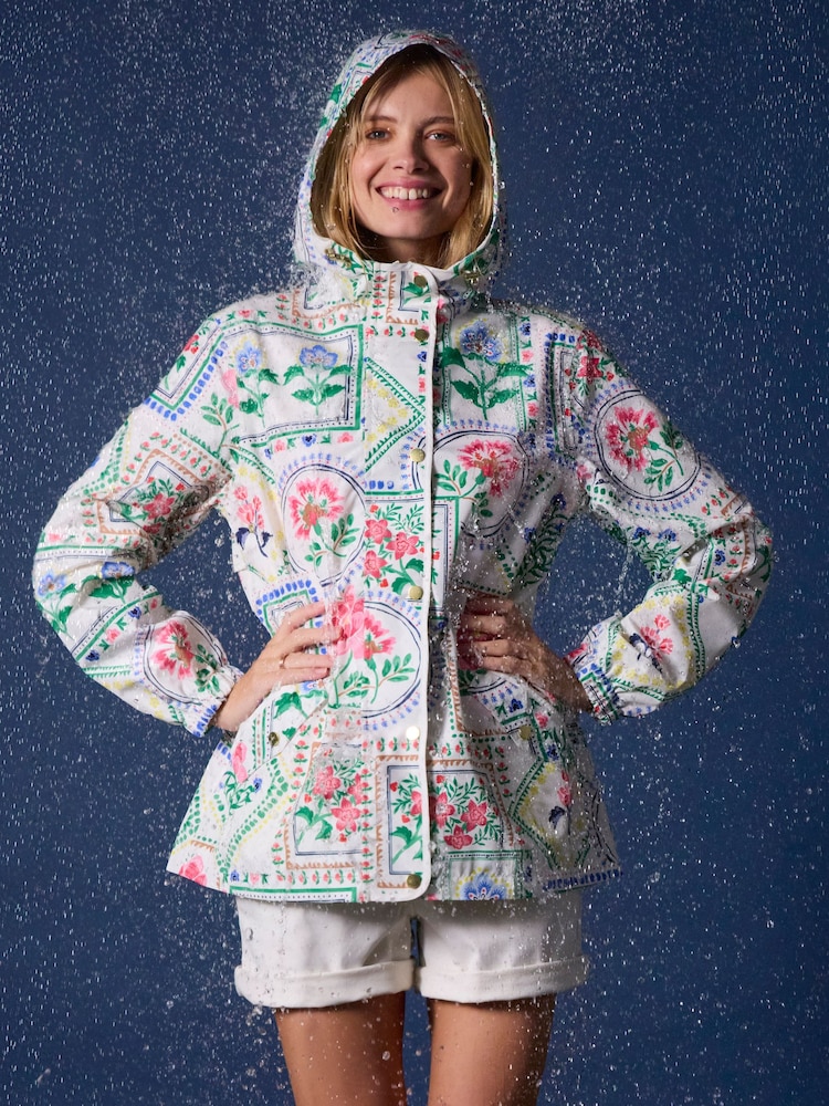 Joules Holt Cream Tile Print Waterproof Packable Raincoat with Hood - Image 1 of 11