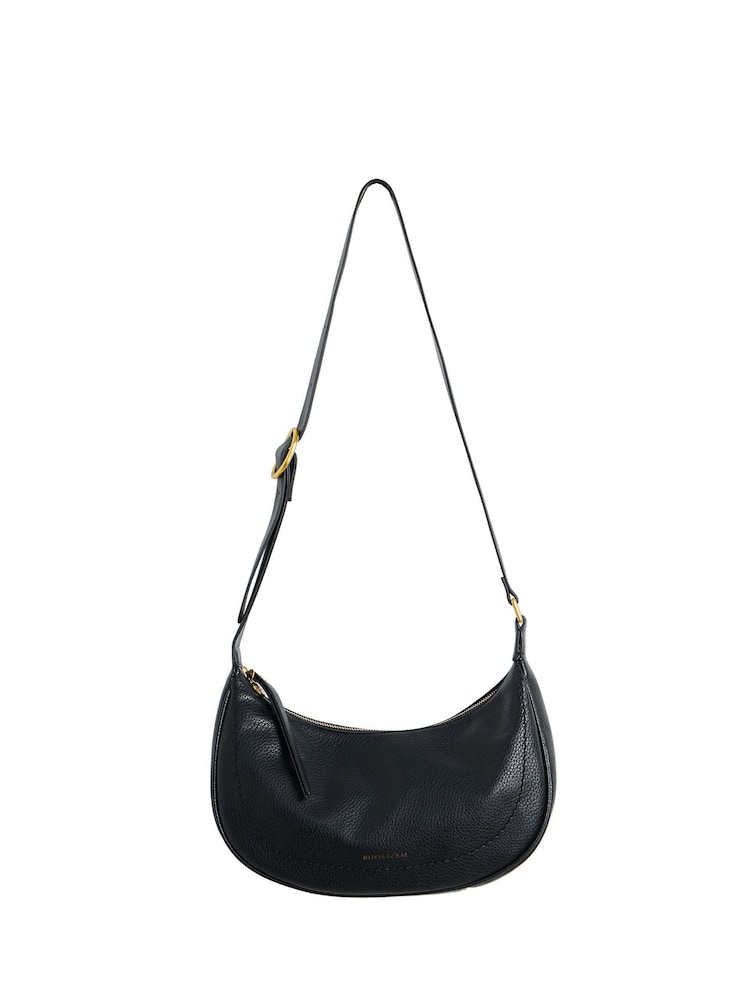 Oliver Bonas Black Curved Sling Ida Crossbody Bag - Image 1 of 8 Oliver Bonas Black Curved Sling Ida Crossbody Bag - Image 1 of 8