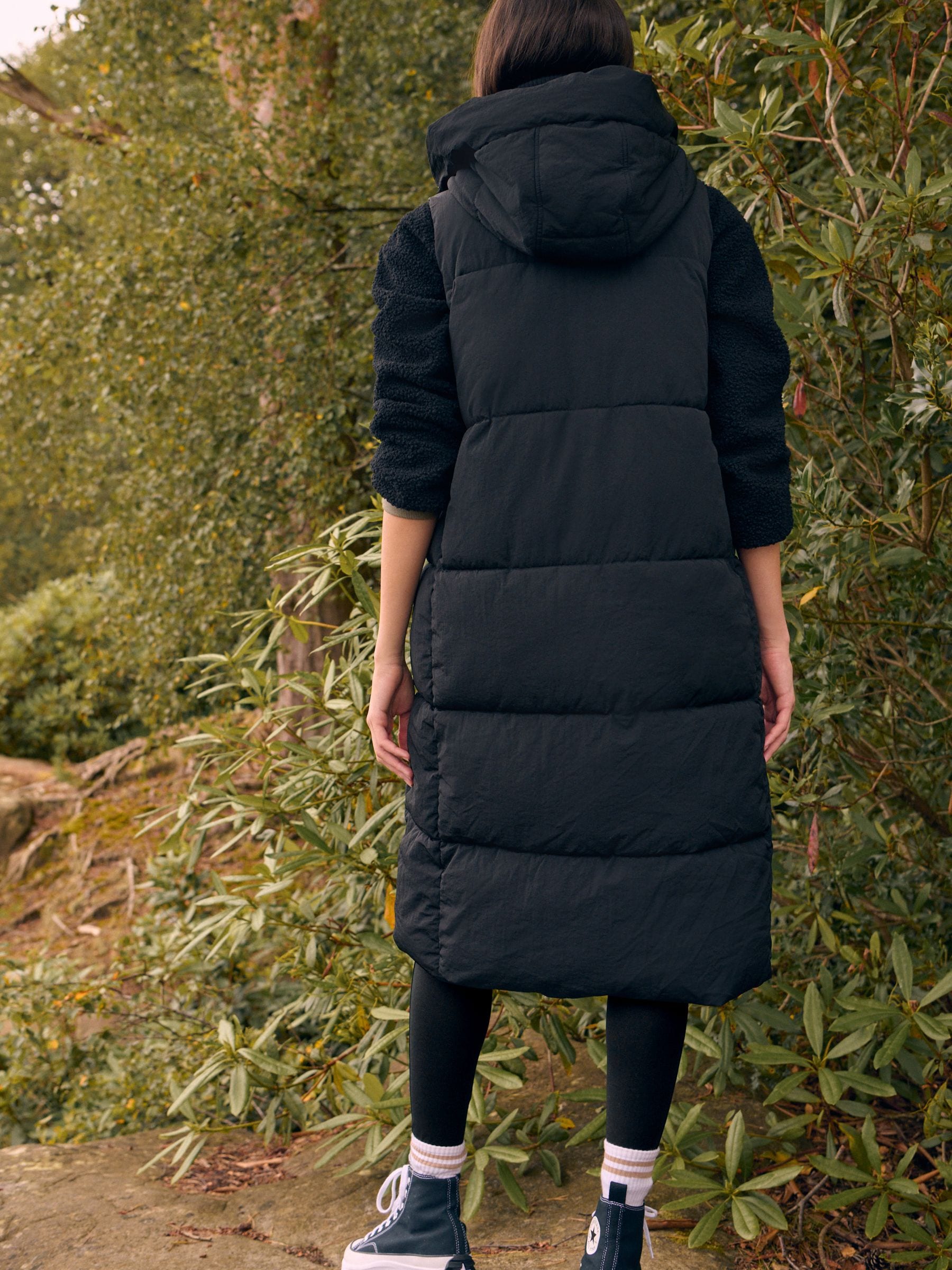 Buy Black Shower Resistant Knit Collar Hooded Padded Gilet from