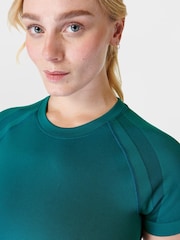 Sweaty Betty Reef Teal Blue/Navy Blue Silhouette Sculpt Seamless Short Sleeve Top - Image 5 of 7