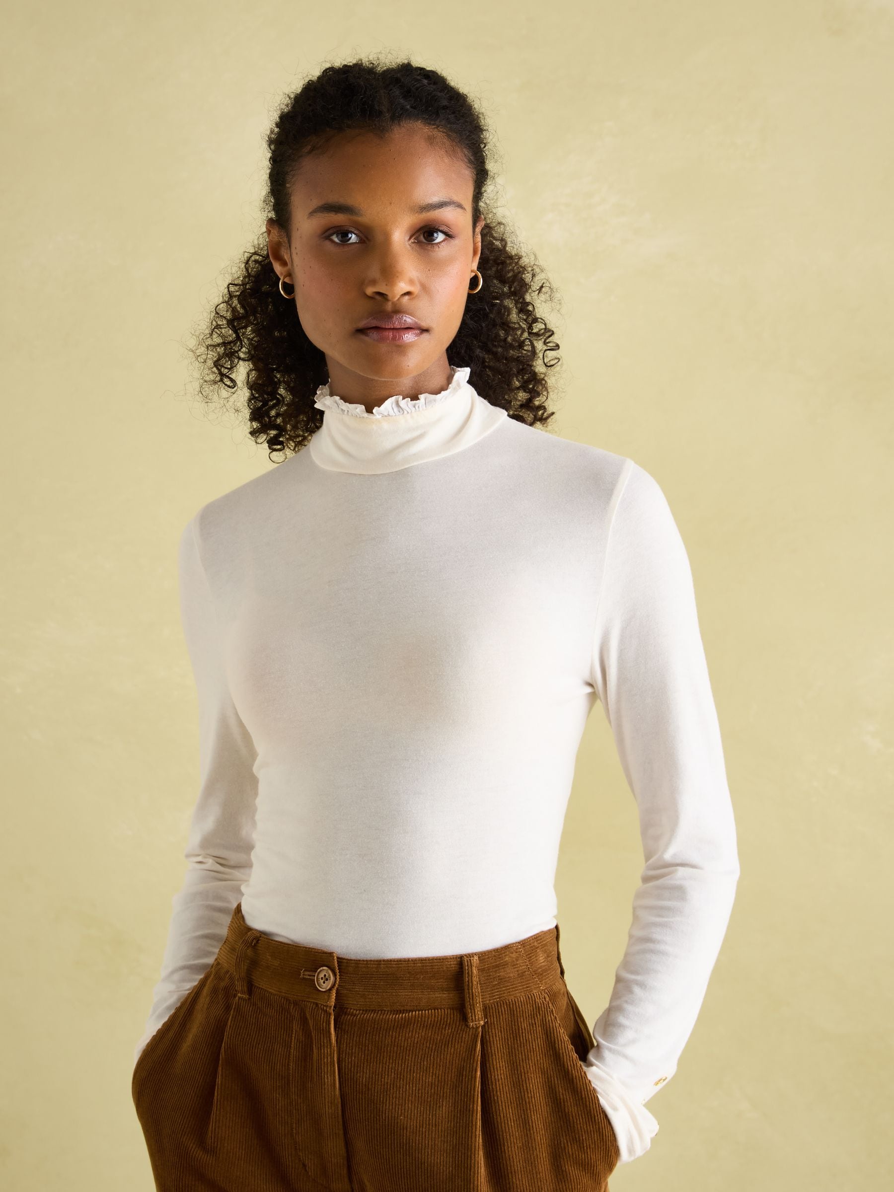 Buy Joules Amy Cream Long Sleeve High Neck Jersey Top from Buy Joules Amy Cream Long Sleeve High Neck Jersey Top from