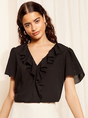 Friends Like These Seersucker Black Ruffle Front Puff Sleeve Blouse - Image 1 of 4