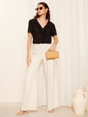 Friends Like These Seersucker Black Ruffle Front Puff Sleeve Blouse - Image 3 of 4