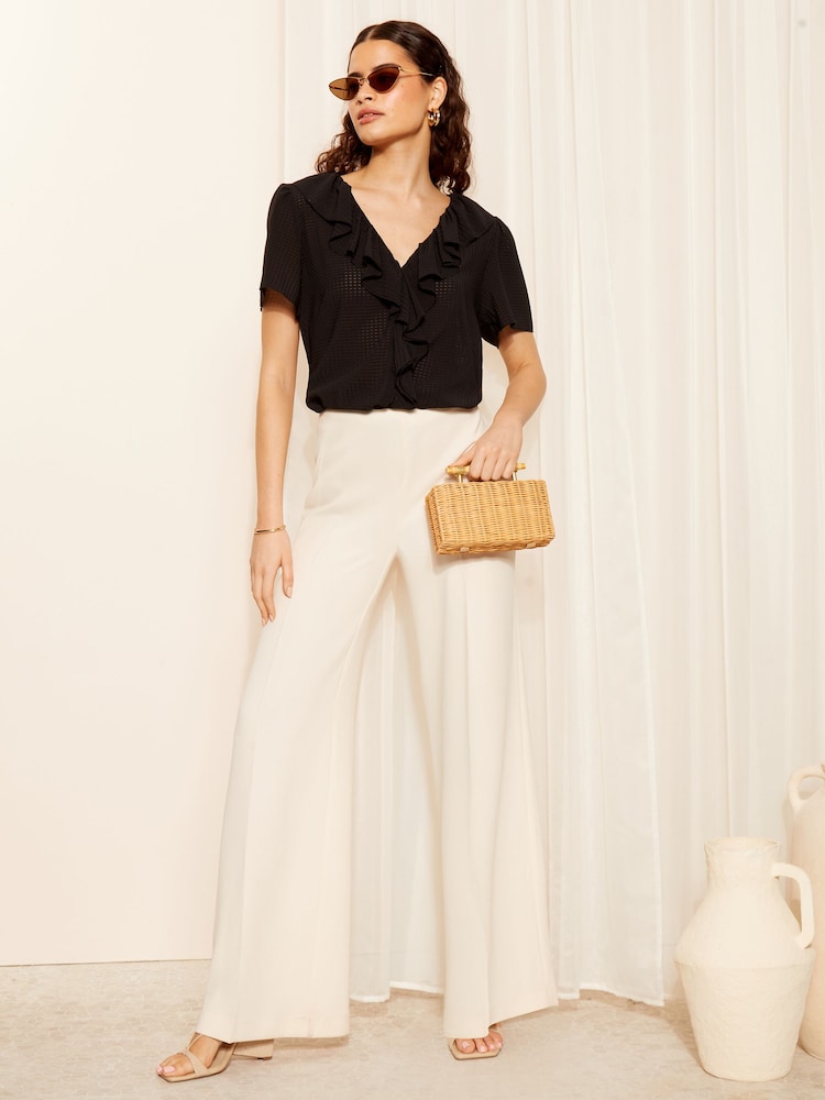 Friends Like These Seersucker Black Ruffle Front Puff Sleeve Blouse - Image 3 of 4